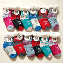 Four pairs of dealonlinenz kids fuzzy winter slippers with soft, warm fabric and gripper soles for safe indoor wear.