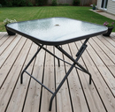 Dealonlinenz 90cm foldable tempered glass garden table showing sleek glass surface and foldable metal frame for outdoor use