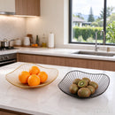 Leaf-shaped wire metal fruit bowl decorative fruit basket in a sculptural open-leaf design