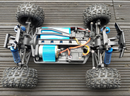 Dealonlinenz 4WD high-speed RC Truggy off-road toy car, 1:18 scale with rugged tires and sleek design for outdoor racing.