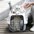 Dealonlinenz 58cm dog and cat airline travel cage with secure door and ventilation for safe pet transportation.