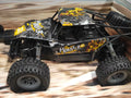 Dealonlinenz 2.4GHz rechargeable remote control mountain racing car with lights, capable of 15KM/H off-road fun.